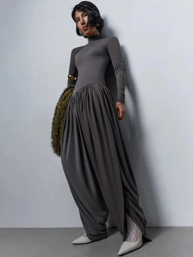 Slim-Fit Patchwork Jumpsuit with Draped Long Sleeves