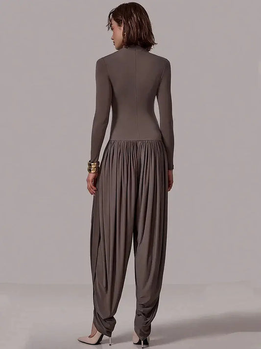 Slim-Fit Patchwork Jumpsuit with Draped Long Sleeves